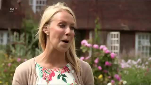 Laura Hamilton asks a couple about a property